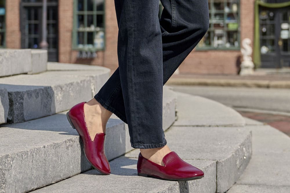A woman wearing the Tammie in Damasco Red.