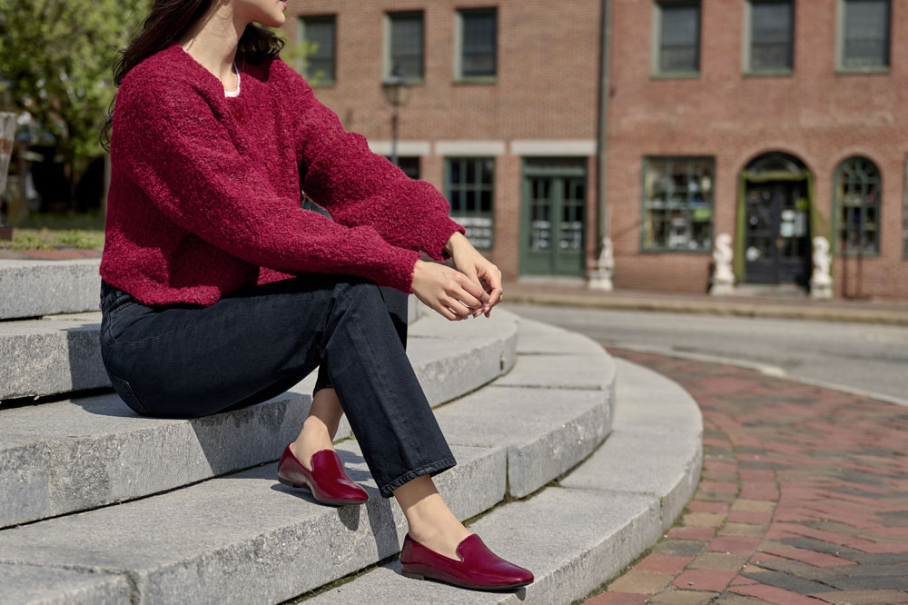 A woman wearing the Tammie in Damasco Red.