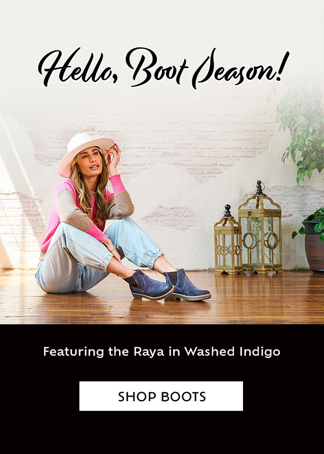 Hello, Boot Season! Featuring the Raya in Washed Indigo. A women sitting on the floor wearing the Raya in Washed Indigo. Shop Boots.