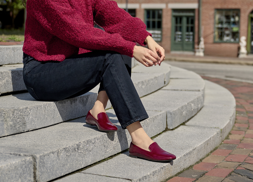 A woman wearing the Tammie in Damasco Red.